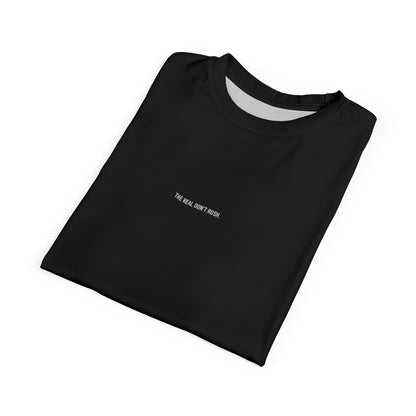 Black Minimalist Tee — Subtle Chest Text "The Real Don’t Rush."