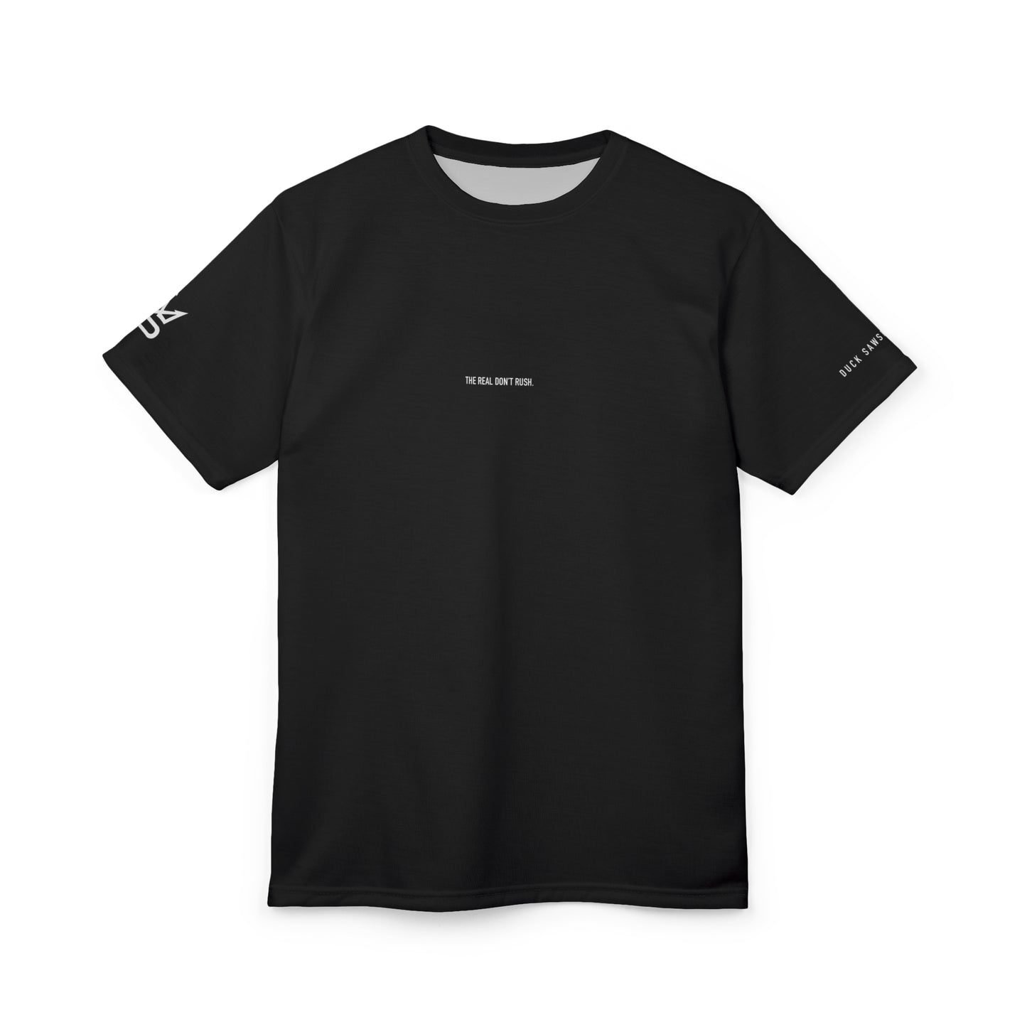 Black Minimalist Tee — Subtle Chest Text "The Real Don’t Rush."