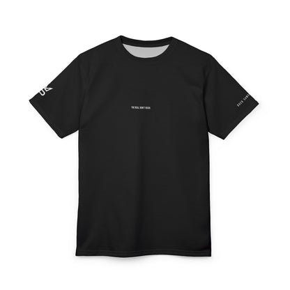 Black Minimalist Tee — Subtle Chest Text "The Real Don’t Rush."