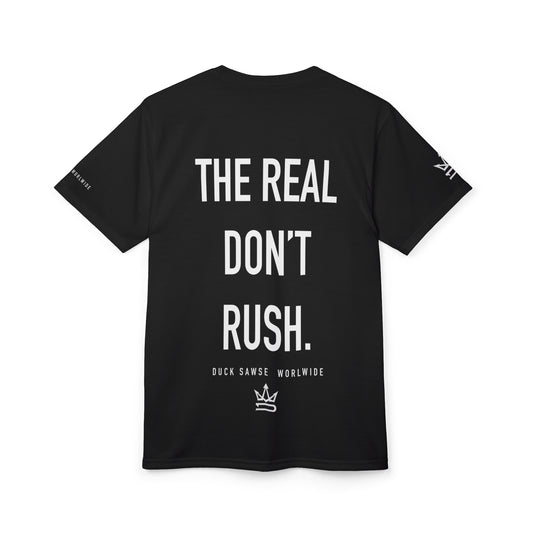Black Minimalist Tee — Subtle Chest Text "The Real Don’t Rush."
